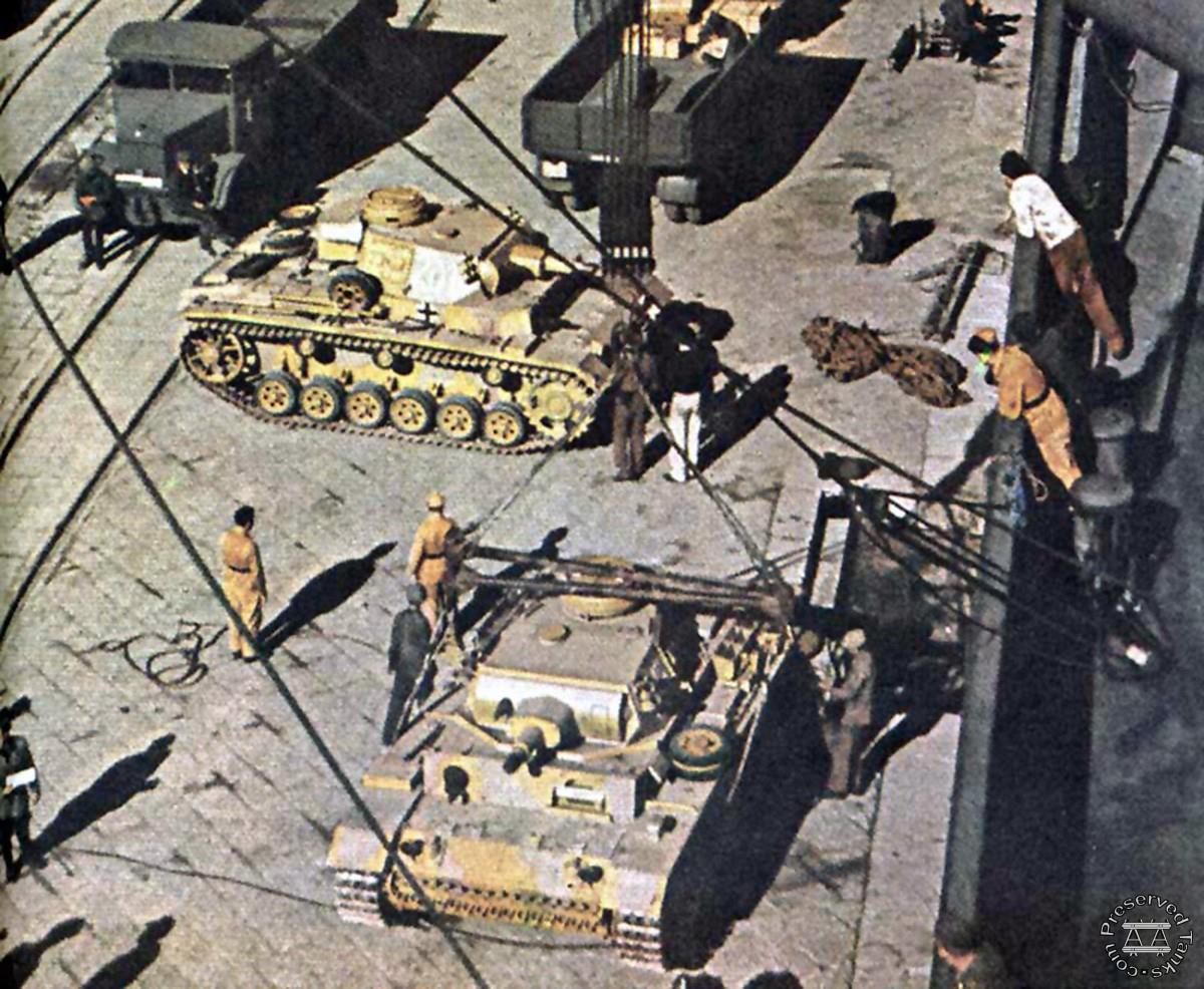 “Panzerkampfwagen III ausf N medium tanks are unloaded from a transport - Schwere Panzer-Abteilung 501 (Heavy Tank Battalion 501) arrived in Tunisia between November 23, 1942 and early January 1943”, photo and caption from WorldWar2Database.com