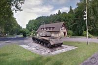 IS-2 tank with museum building behind