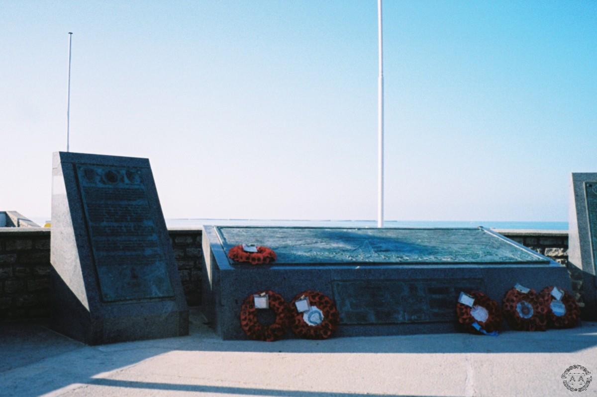 Memorials beside the museum overlooking the beach