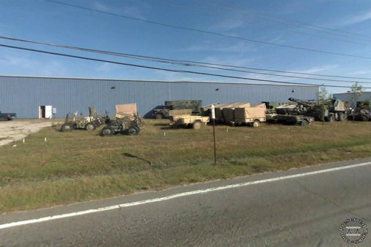 Vehicles stored beside main entrance
