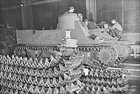 “New M7 Priest 105 mm self-propelled howitzer carriages roll down the production lines of the American Locomotive Company in Schenectady, New York”, photo by H.R. Hollem