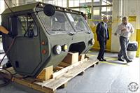 “Secretary of Defense Robert M. Gates tours the tactical and combat vehicle production lines with Davis May, far right, Tactical Division Chief, May 2, 2008, during a visit to Red River Army Depot in Texarkana, Texas” - DoD photo by Cherie Cullen, www.army.mil