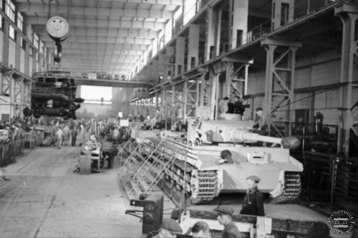 Tiger manufacture at Henschel - note early production commander
