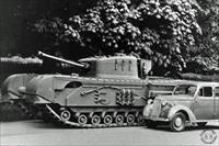 A publicity shot of a Churchill tank built at the Vauxhall works alongside one of the cars built there, photo from BBC.co.uk