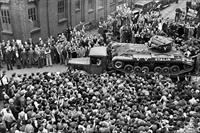“Crowd of British factory workers checking out the Valentine tank named 