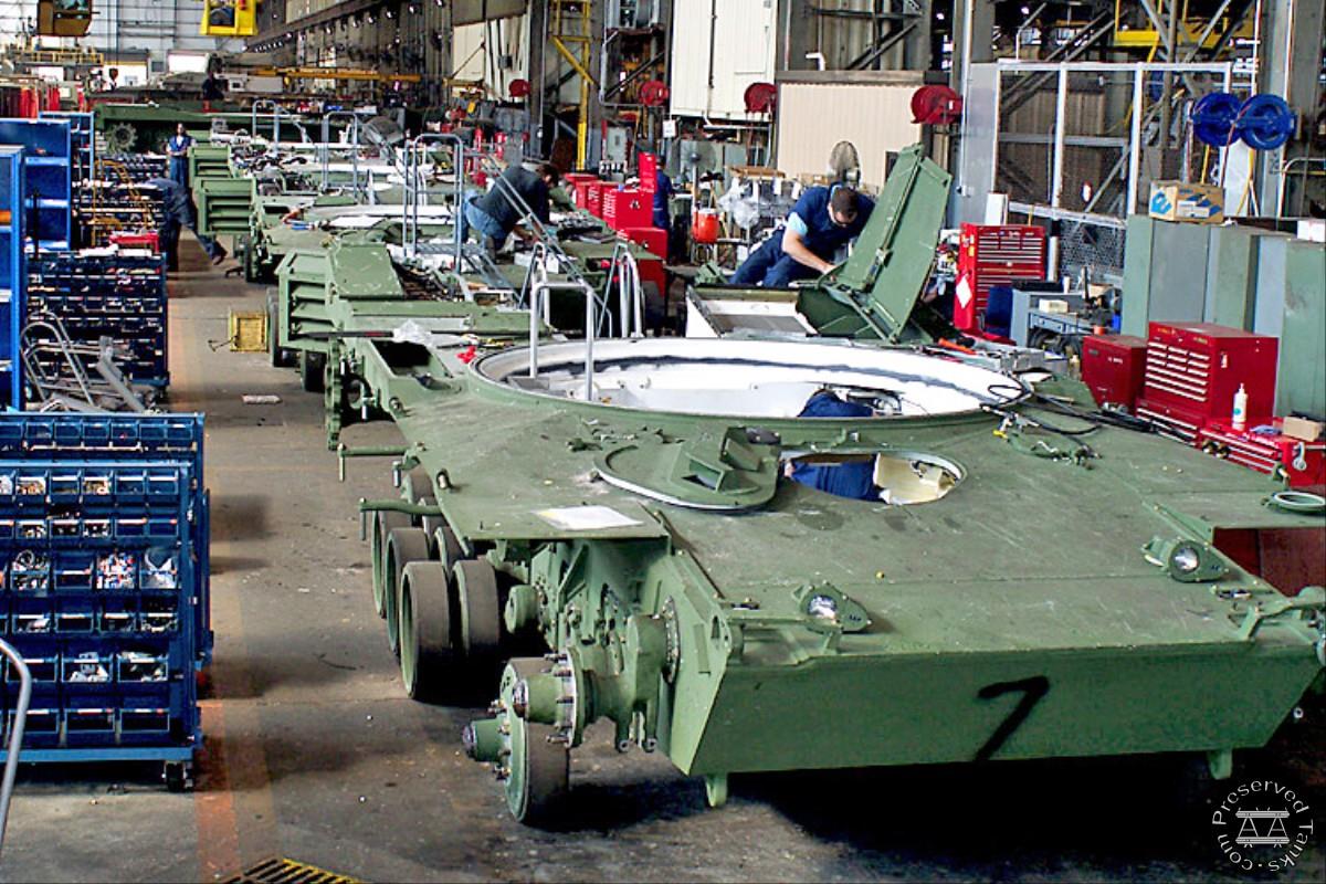“Four M-1 Abrams tanks are in various stages of upgrade on the reassembly line at Anniston Army Depot Combat Vehicle Facility”, from Defense.gov