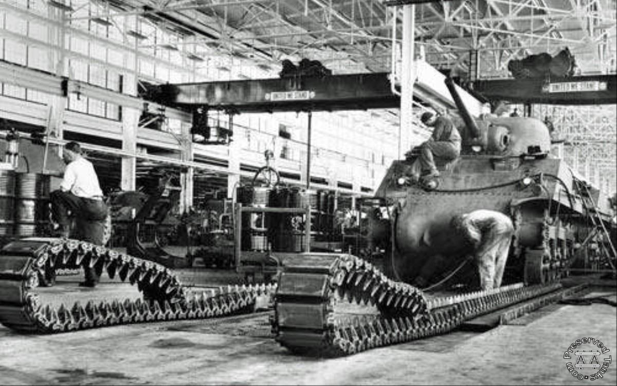 “A Sherman M-4 tank is fitted with tracks at a Fisher Body plant in 1942”, photo from DetNews.com