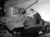 “Workman finishes assembly on a tank at the Angus shops” - vehicle is a Valentine tank