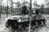 Right rear view - original caption: "Oologsmuseum, Overloon. A man and a woman sitting on a [American] tank on the museum grounds", photo from Wiel van der Randen archive