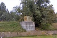 The Pershing tank is located either in this concrete and metal structure or one of the ones along this road nearby