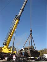 Being lifted from transporter at railhead