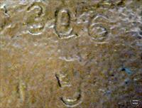 Close-up of stamping marks on transmission cover