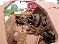 View from front through gun aperture into fighting compartment