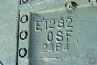 Markings on centre transmission cover, with stamped number just visible at top of picture